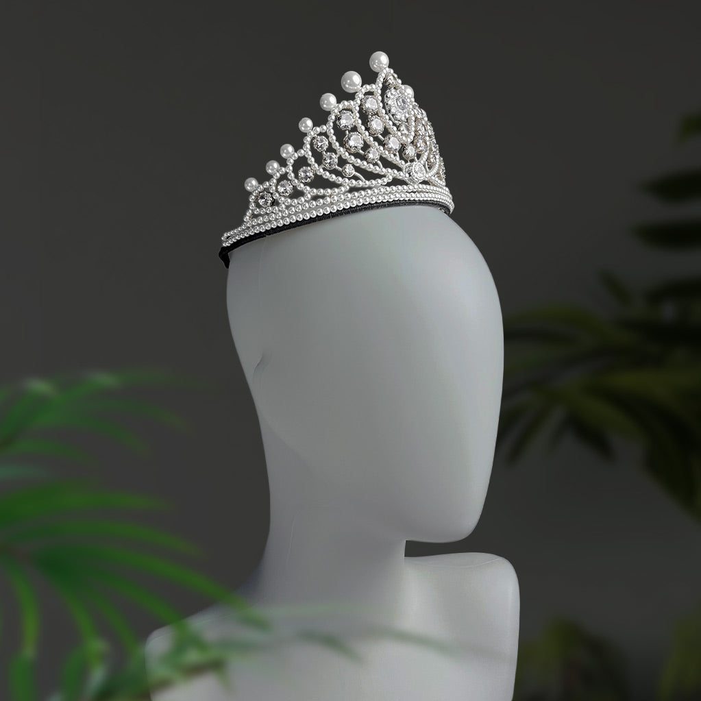 Back and side angle of a handcrafted crystal tiara showing the hand-wired pearl details. 