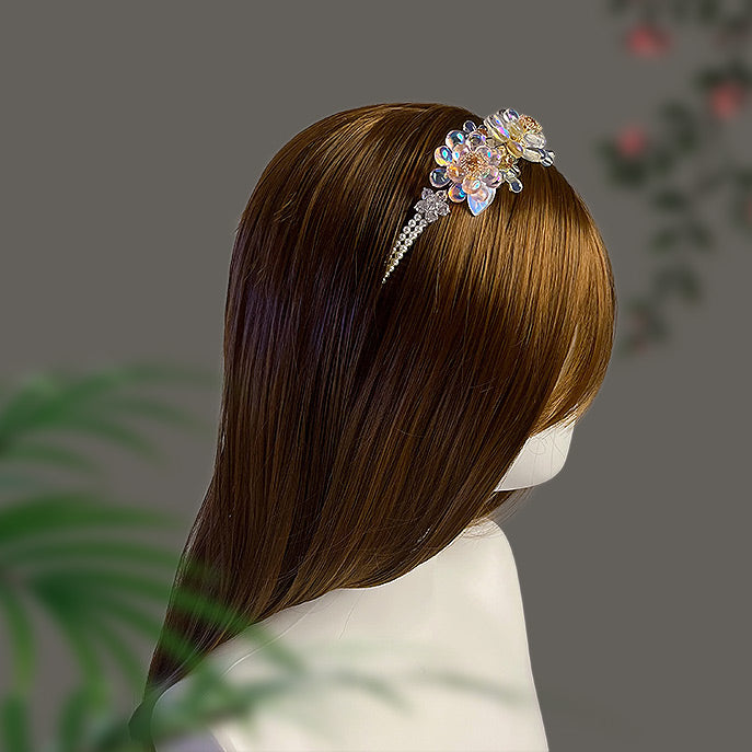 Bridal model wearing the Ethereal Bloom Liuli floral headband with hair styled down, viewed from the back.

