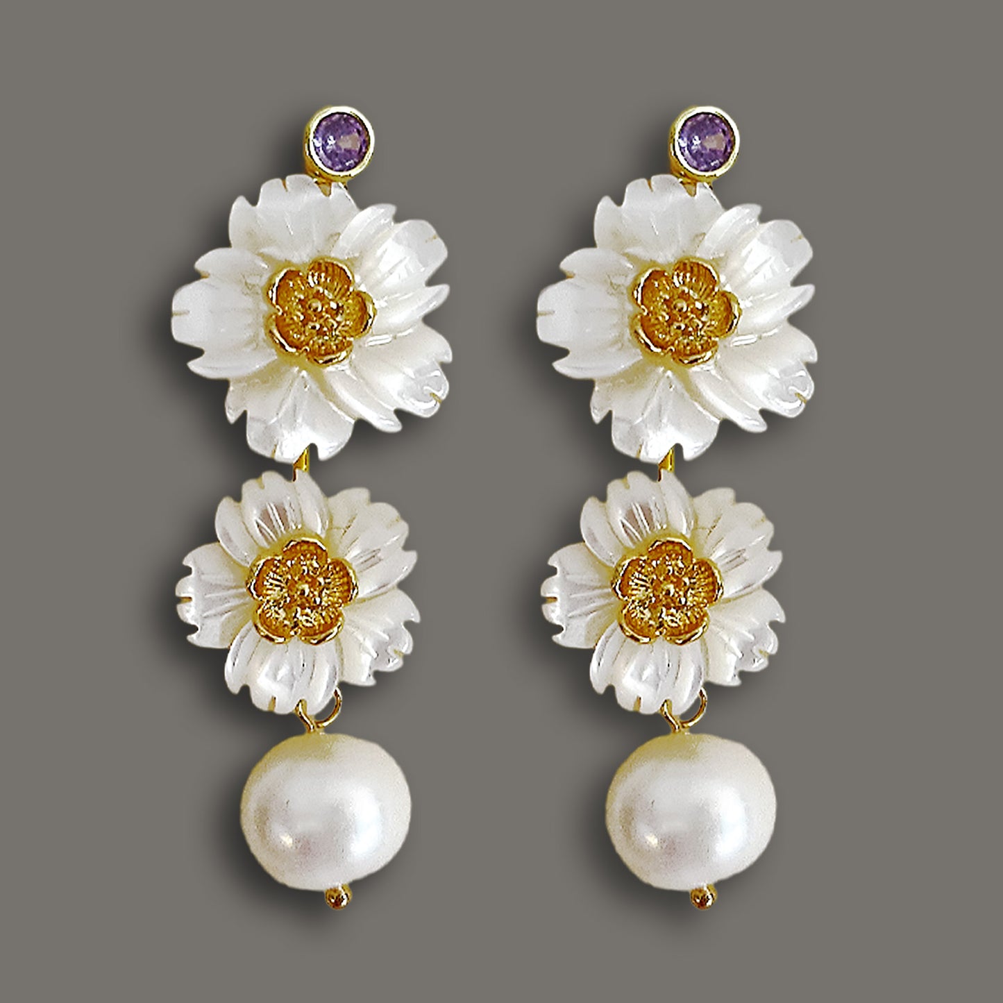 Luminous bloom mother-of-pearl drop earrings with purple gemstone accents