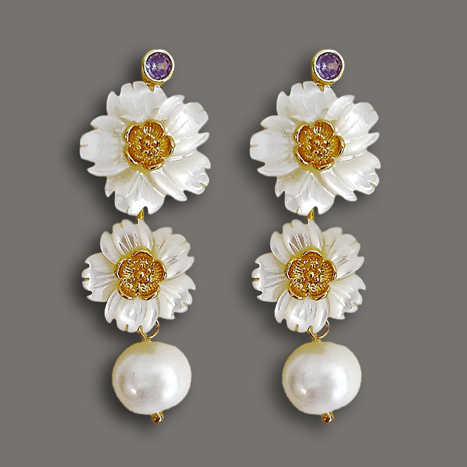 Luminous bloom mother-of-pearl drop earrings with purple gemstone accents