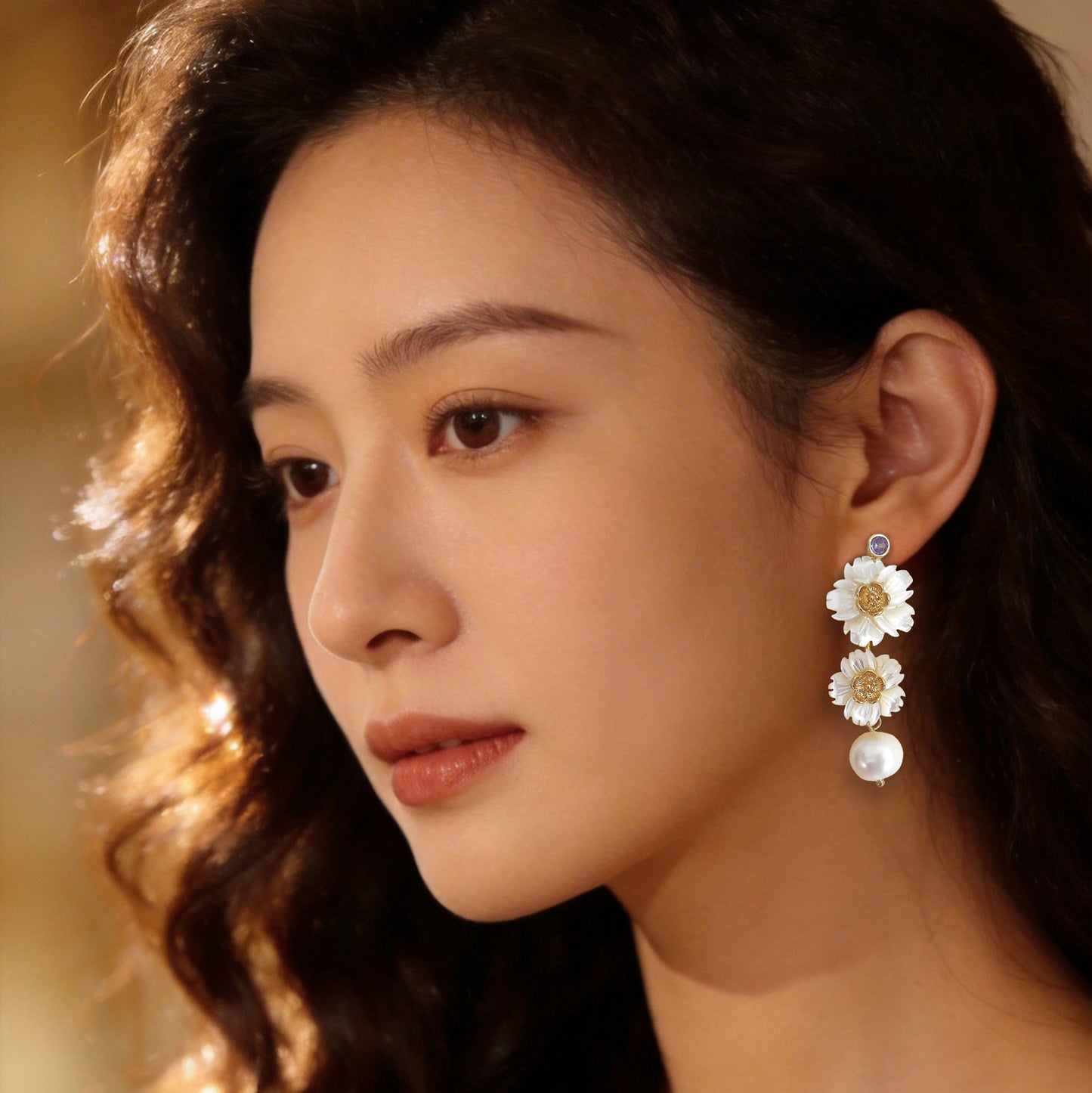 Elegant woman wearing vintage-inspired mother-of-pearl floral earrings