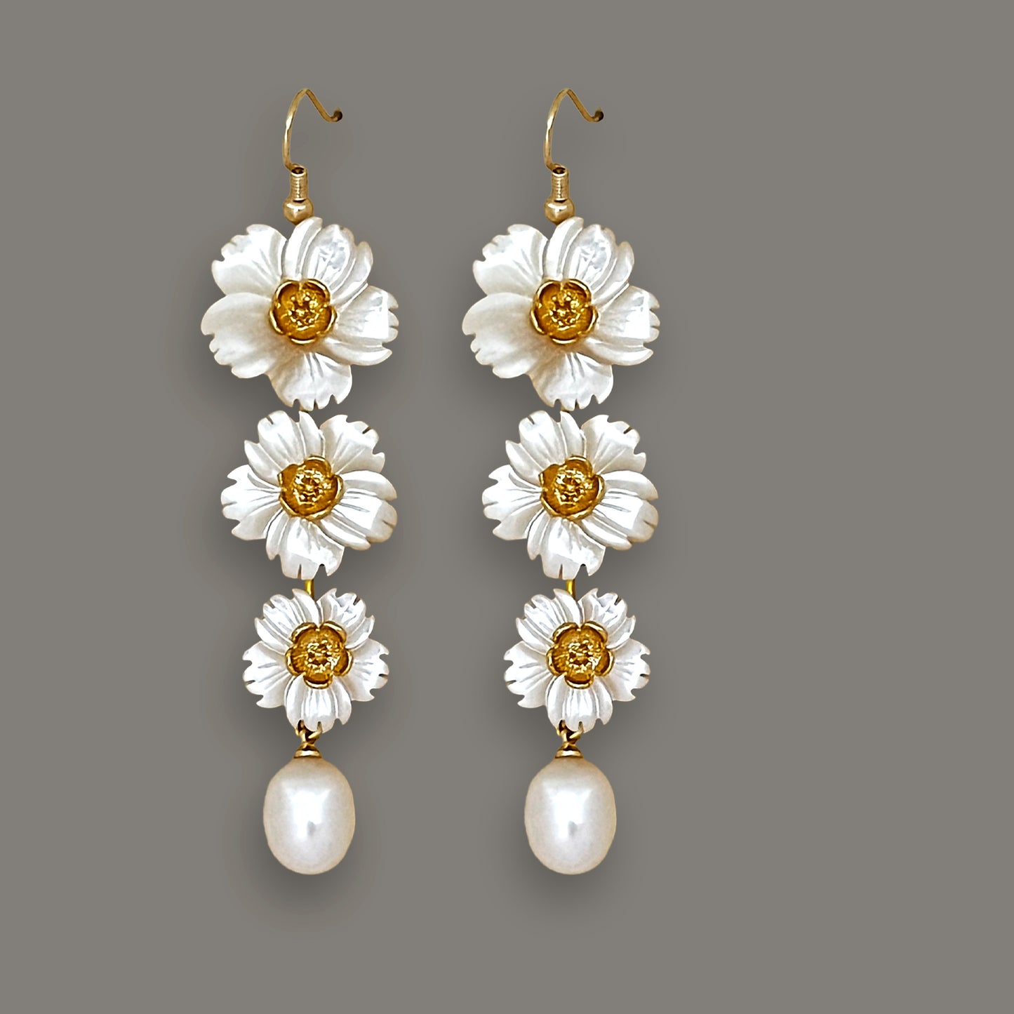 Tiered white mother-of-pearl daisy dangle earrings with pearl drops