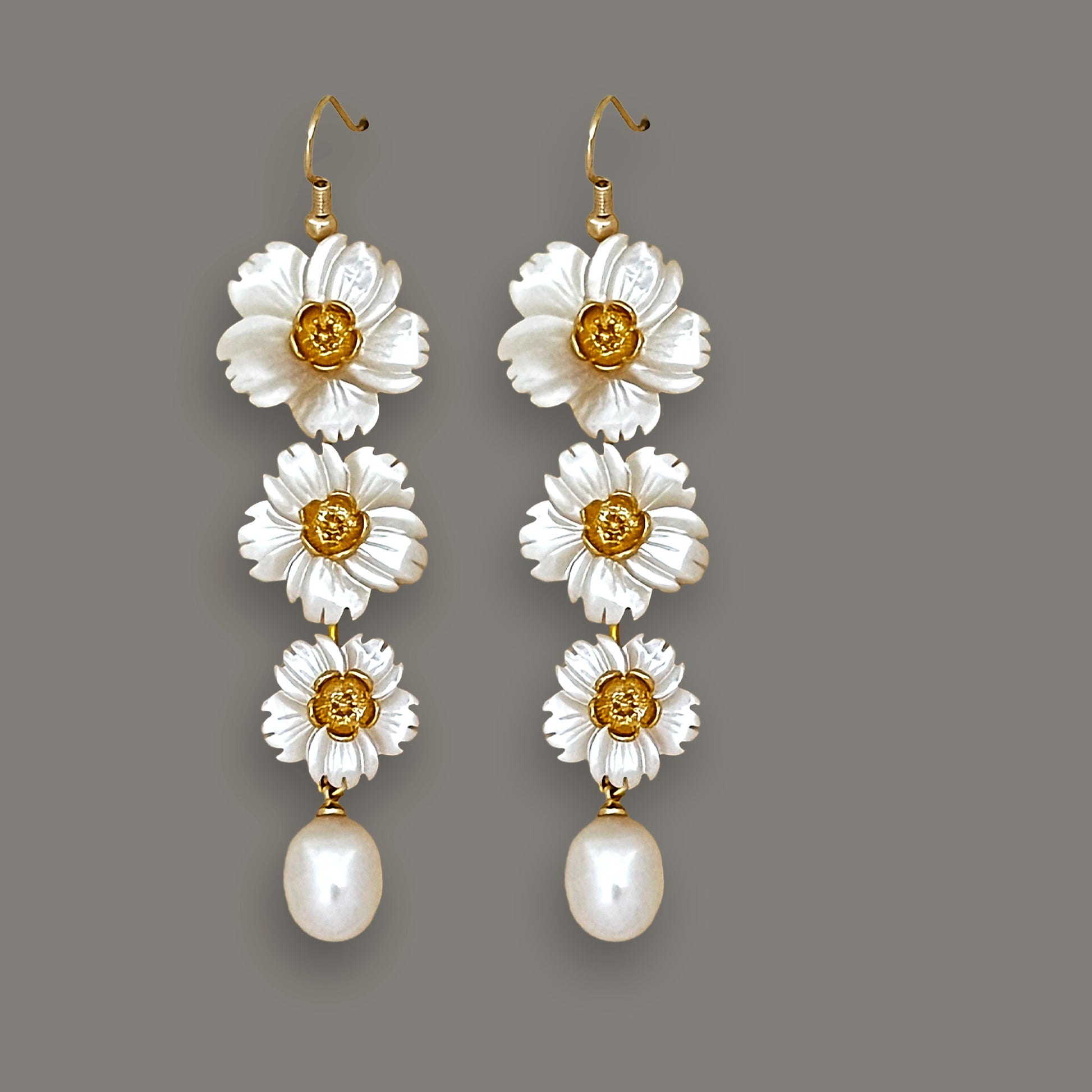 Tiered white mother-of-pearl daisy dangle earrings with pearl drops